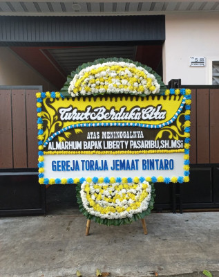 Papan Bunga Duka di Tugujaya